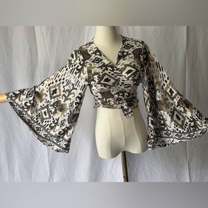 Chic Patterned Wrap Blouse with Bell Sleeves